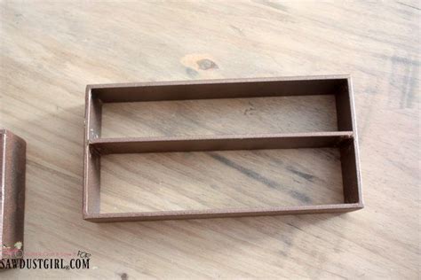 wood centerpiece with metal brackets|brazing metal table brackets.